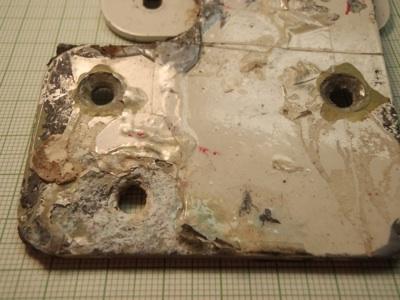 Image of aluminum alloy plate in various states of corrosion.